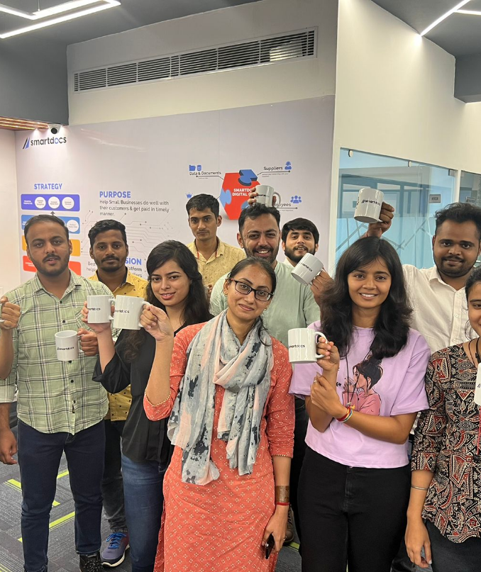 SmartDocs team celebrating in the office
